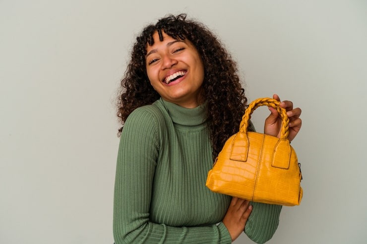 young-mixed-race-woman-holding-h